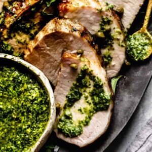 Pork Tenderloin with Chimichurri Grilled Pork with Chimichurri Sauce and Mashed Potatoes, Roasted Broccoli